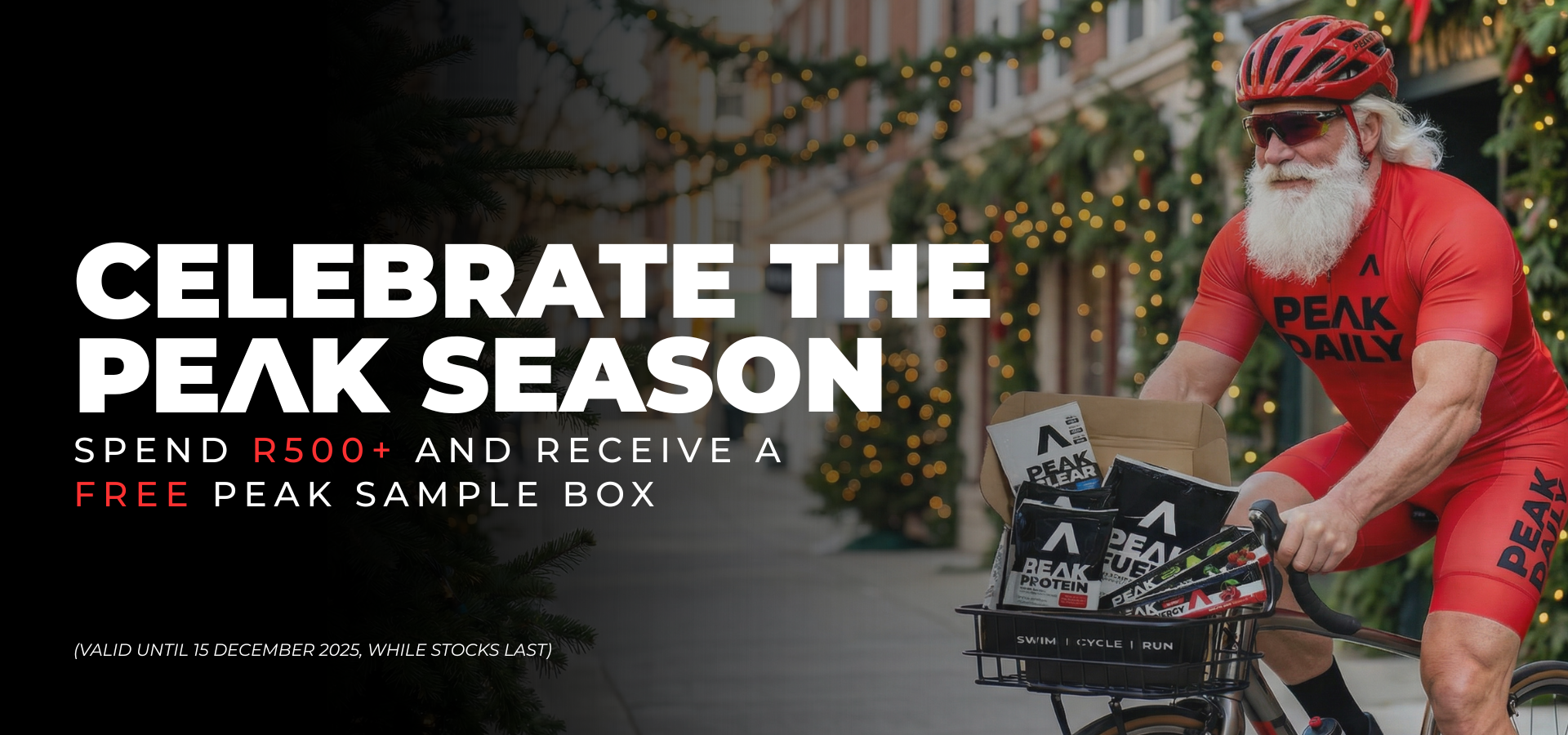 Person in red cycling outfit with 'Peak Daily' branding, surrounded by festive decorations.slider_item_RTA4Yh