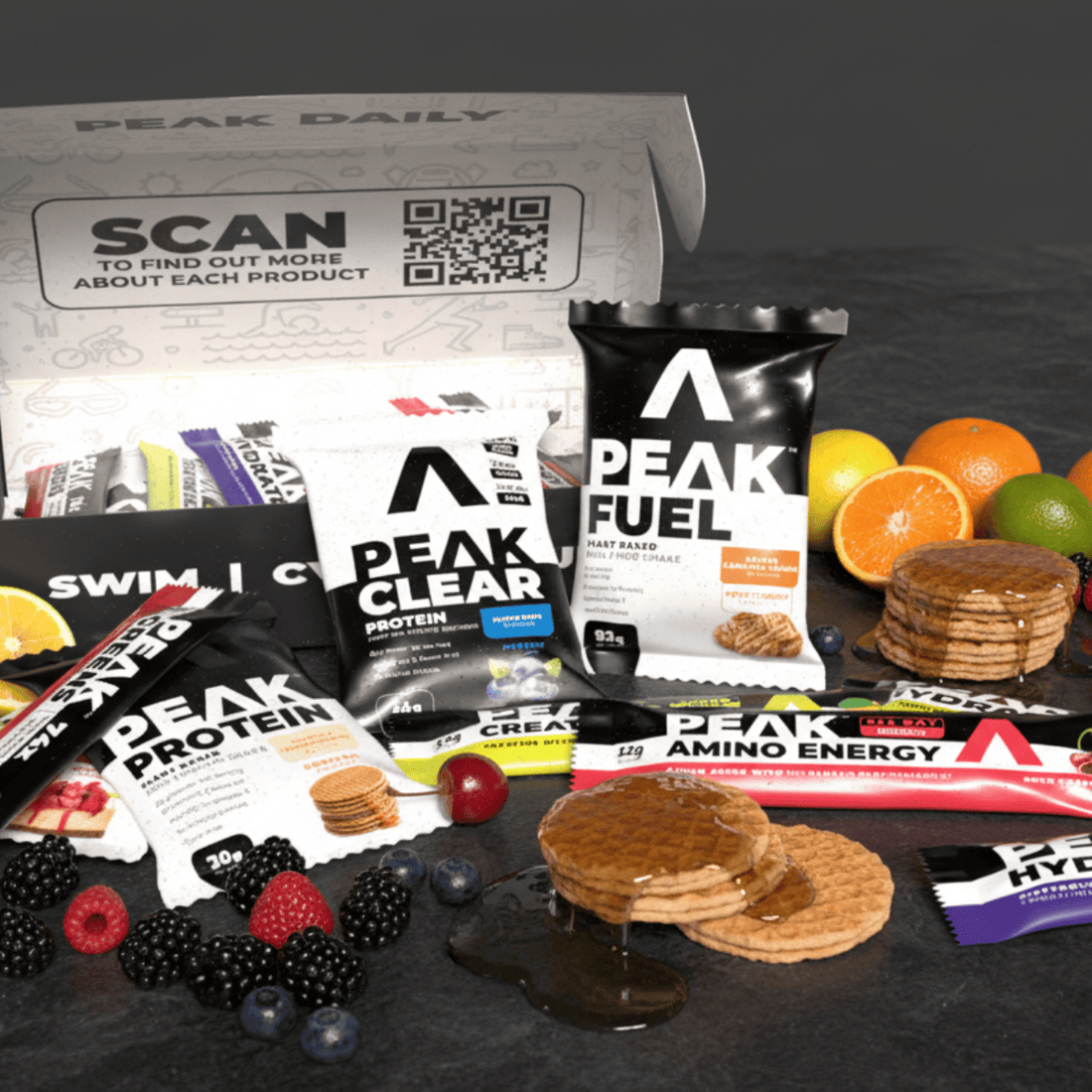 Assorted Peak Protein and Peak Fuel packages on a white background