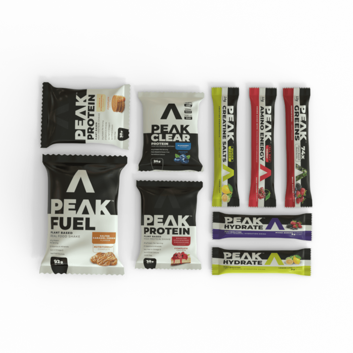 Assorted Peak Protein and Peak Fuel packages on a white background